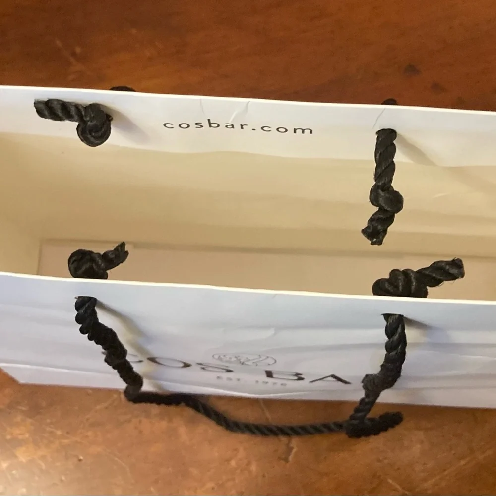 Cos Bar logoEst. 1976 white gloss tote bag black string handles cardboard insert